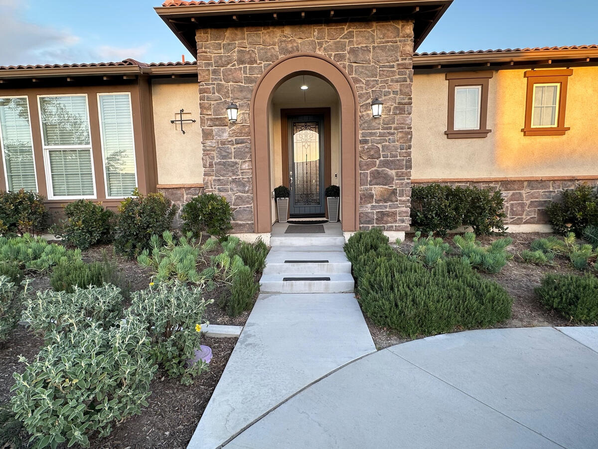 Backyard before artificial turf and paver installation in Riverside, California.