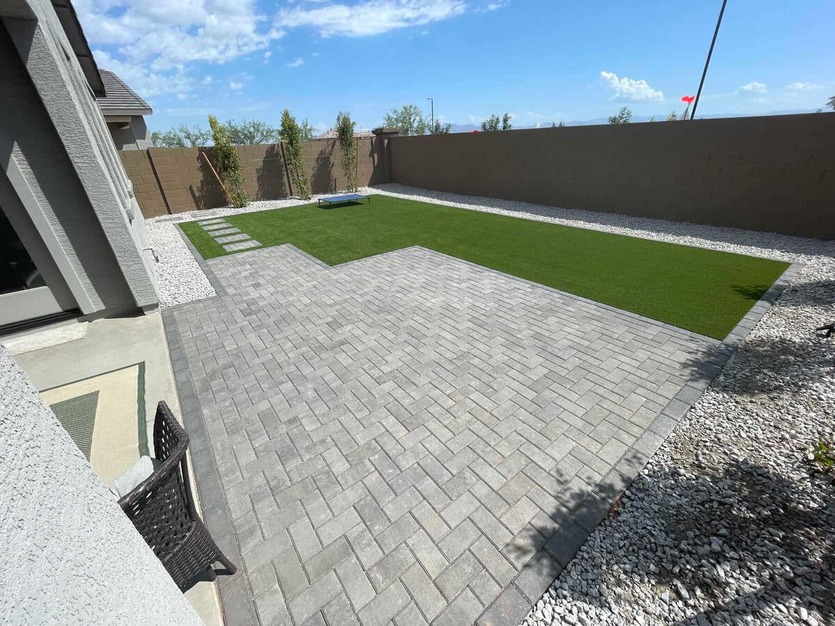 Artificial turf installation in Riverside backyard by Precision Turf & Pavers